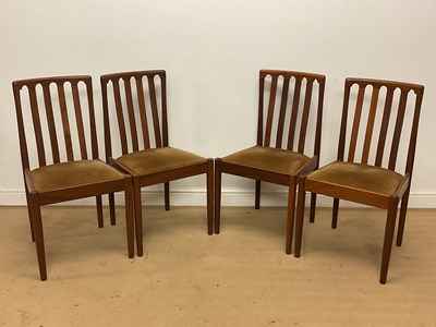 Lot 542 - MEREDEW; a set of four 1970s teak dining...