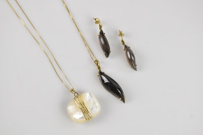 Lot 395 - URI GELLER; a contemporary 9ct gold and mother...