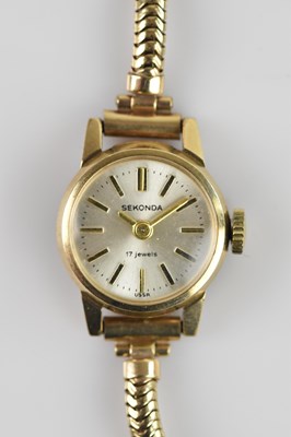 Lot 1079 - SEKONDA; a lady's 9ct gold cased wristwatch,...