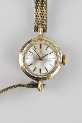 Lot 1080 - OMEGA; a lady's 14ct yellow gold cased...