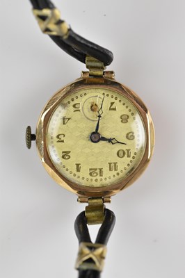 Lot 1095 - A 9ct yellow gold lady's wristwatch, the dial...