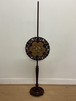 Lot 546 - A 19th century mahogany adjustable pole screen...