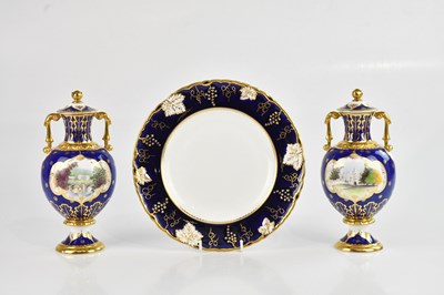 Lot 234 - ROYAL CROWN DERBY; a pair of limited edition...