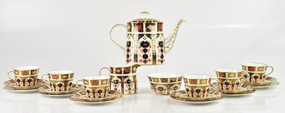 Lot 224 - ROYAL CROWN DERBY; a six setting tea service...