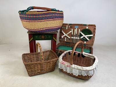 Lot 22 - A vintage wicker picnic hamper with contents,...