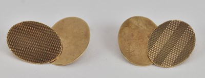 Lot 1376 - A pair of 9ct yellow gold oval faced cufflinks,...