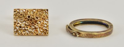 Lot 1199 - A 9ct yellow gold rectangular faced cufflink,...