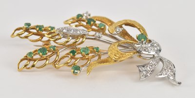 Lot 1381 - An 18ct yellow gold diamond and emerald set...
