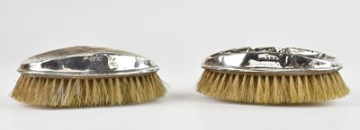 Lot 225 - Two George VI hallmarked silver backed brushes,...