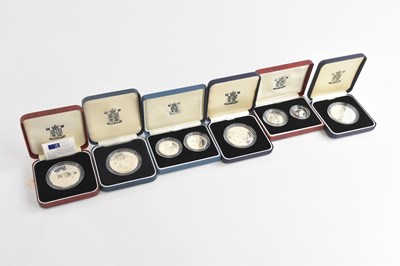 Lot 600 - THE ROYAL MINT; six cased silver proof coin...