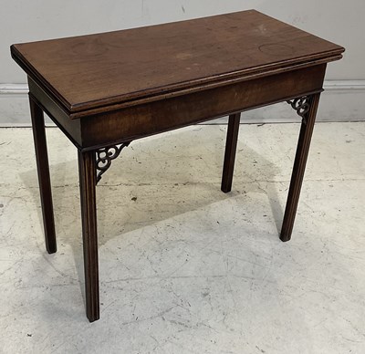 Lot 1122 - A George III mahogany tea table, with hinged...