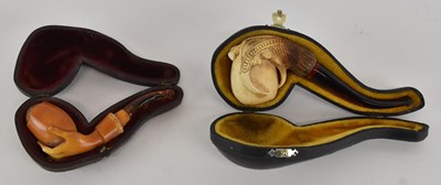 Lot 300 - Two leather cased Victorian Meerschaum pipes,...