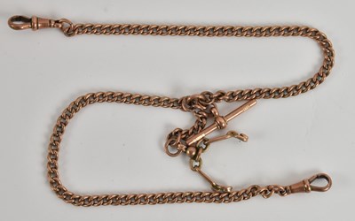 Lot 1307 - A 9ct rose gold Albert chain, with T-bar and...