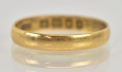 Lot 1249 - A 22ct yellow gold band ring, size L/M, approx...