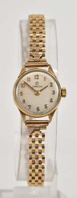 Lot 1505 - OMEGA; a lady's 9ct yellow gold cased...
