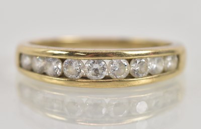 Lot 1271 - A 9ct yellow gold white stone set half...