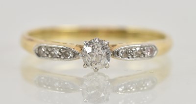 Lot 1242 - A yellow metal diamond solitaire ring, the...