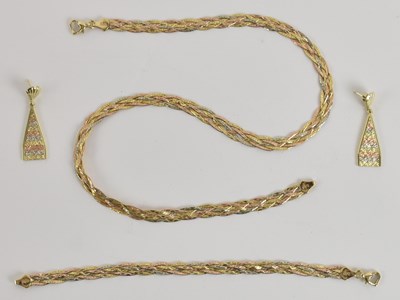 Lot 1308 - A suite of 14ct tricolour gold semi-rigid...