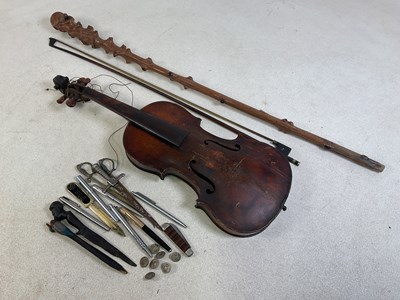 Lot 51 - A distressed violin, length of back 36cm, (af),...