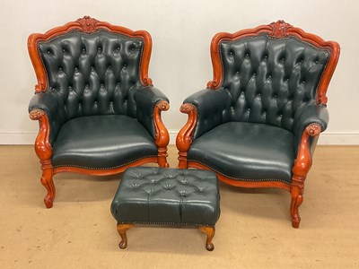 Lot 566 - A pair of reproduction button back leather...