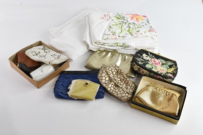 Lot 1238 - A small collection of vintage handbags and linen.