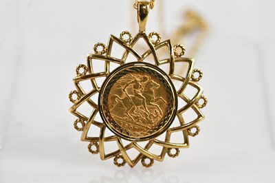 Lot 323 - An Edward VII half sovereign, 1907, fitted in...