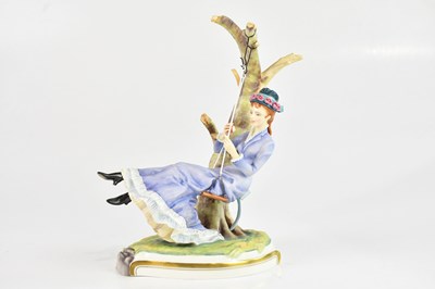 Lot 1117 - ROYAL WORCESTER; a figure, ‘Alice’ from the...
