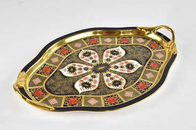 Lot 237 - ROYAL CROWN DERBY; a large twin handled shaped...