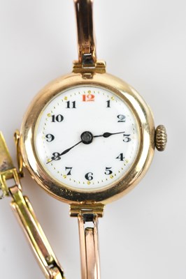 Lot 1083 - A lady's 9ct gold wristwatch, the dial set...