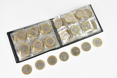 Lot 558 - A collection of sixty-seven £2 coins including...