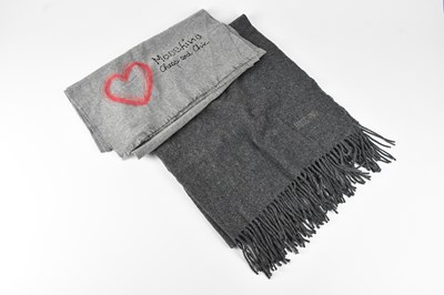 Lot 1305 - MOSCHINO; a large 100% wool dark grey scarf,...