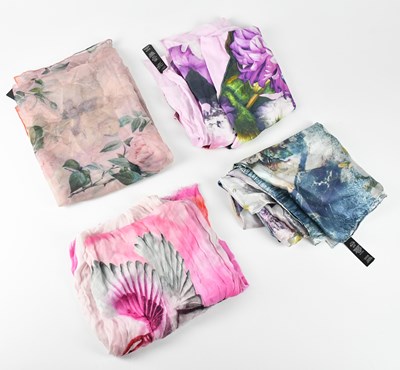 Lot 1286 - TED BAKER; four scarves comprising a large...