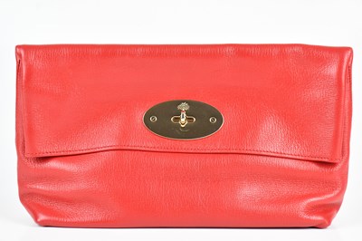 Lot 1524 - MULBERRY; a red pebbled leather clutch bag,...