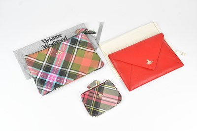 Lot 1466 - VIVIENNE WESTWOOD; a tartan leather zipped...