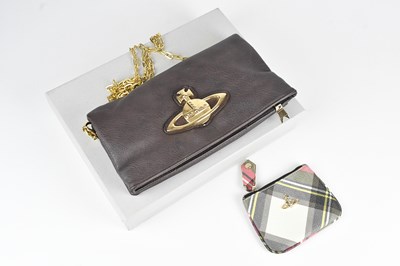 Lot 1467 - VIVIENNE WESTWOOD; a brown textured leather...