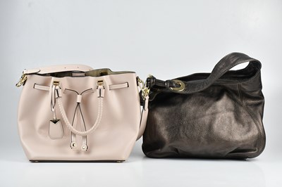 Lot 1517 - MICHAEL KORS; a pink leather bucket style...