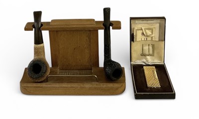 Lot 296 - SMOKING INTEREST; an early 20th century carved...