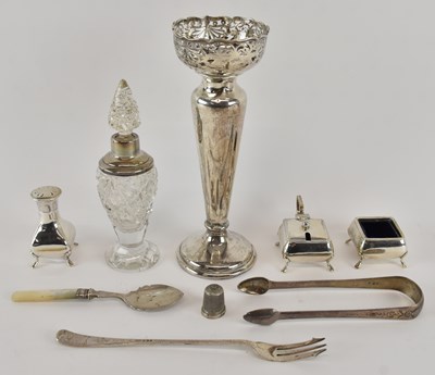 Lot 1145 - A George V hallmarked silver three piece cruet...