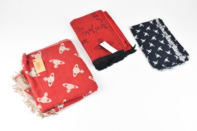 Lot 1264 - VIVIENNE WESTWOOD; a large red 100% wool scarf,...