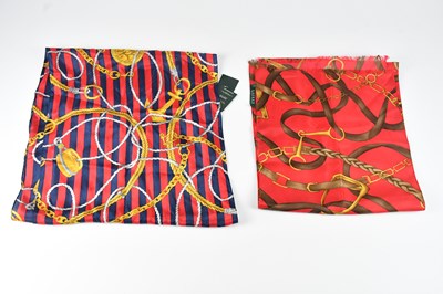 Lot 1277 - RALPH LAUREN; two long red and gold silk...