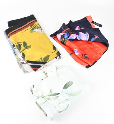 Lot 1281 - TED BAKER; a large 100% silk scarf with floral...