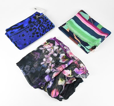 Lot 1307 - TED BAKER; a large black and blue animal print...
