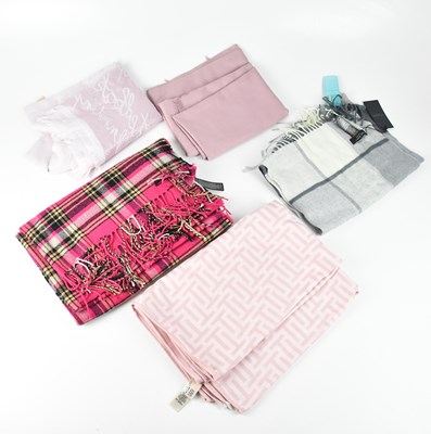 Lot 1267 - TED BAKER; five scarves comprising two dusty...