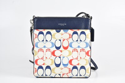 Lot 1514 - COACH; a cream Saffiano leather crossbody...