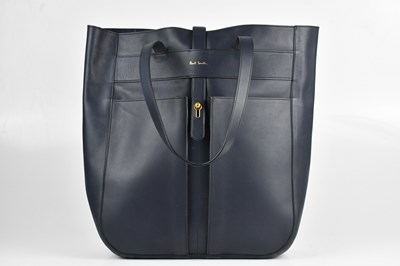 Lot 1498 - PAUL SMITH; a navy blue calfskin leather tote...