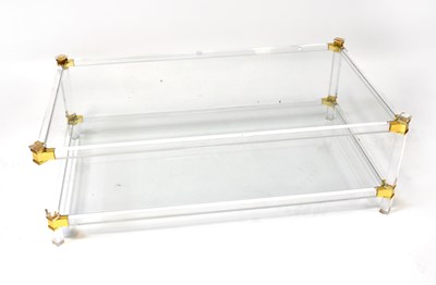 Lot 62 - ATTRIBUTED TO PIERRE VANDEL; a Lucite two-tier...