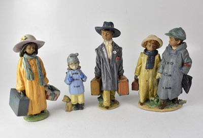 Lot 679 - LLADRÓ; three matte glazed figures of young...