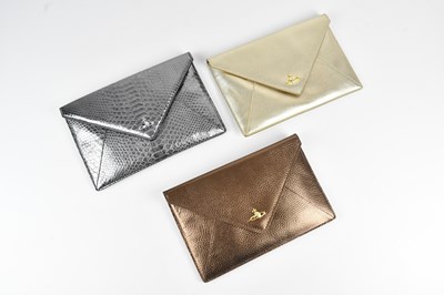 Lot 1208 - VIVIENNE WESTWOOD; three envelope leather...