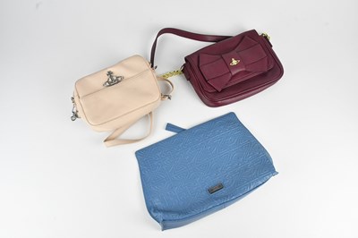 Lot 1487 - VIVIENNE WESTWOOD; a burgundy red pebbled...
