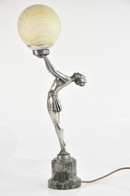 Lot 1177 - An Art Deco style figural lamp formed as a...